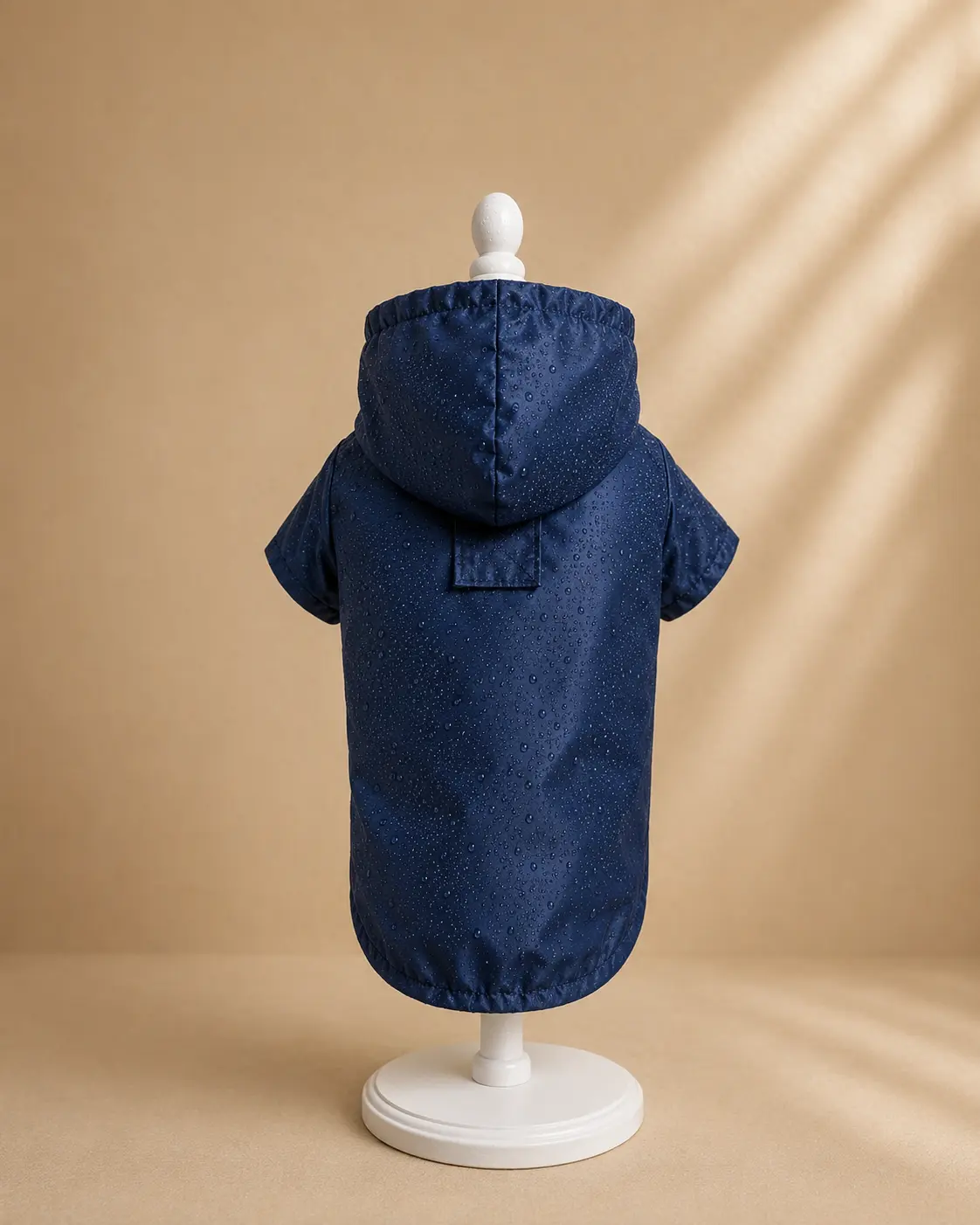Impermeable para perro color azul petróleo de la colección Rain de Dinasty, vista frontal